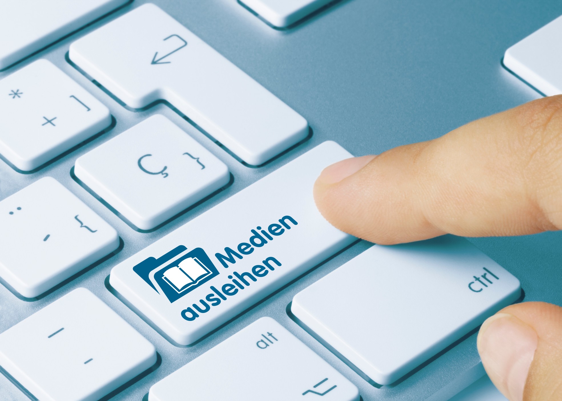 Tastatur mit Taste "Medien ausleihen" und Finger darauf